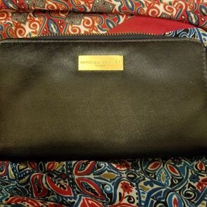 Navy blue wallet. Adrienne